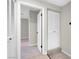 Bright hallway with access to bedrooms and closets at 3357 Narod St, Las Vegas, NV 89121