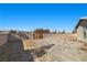 Large gravel backyard with block wall and gated entry at 3450 Verde Ave, Pahrump, NV 89048