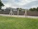 Spacious backyard features old play structure, perfect for customization and recreation at 390 China St, Pahrump, NV 89048