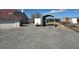 Exterior shot of the property showing a trailer port and lots of room for storage at 390 China St, Pahrump, NV 89048
