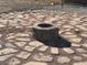 Outdoor firepit area with stone pavers, perfect for entertaining or relaxing in the evening at 390 China St, Pahrump, NV 89048