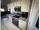 The kitchen offers stainless steel appliances and granite countertops at 390 China St, Pahrump, NV 89048