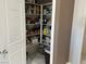 Well-stocked pantry featuring ample shelving for organized storage solutions at 390 China St, Pahrump, NV 89048