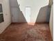 Covered patio area with neutral color scheme and entry doors leading to the interior at 390 China St, Pahrump, NV 89048