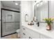 Modern bathroom with white vanity and walk-in shower at 4165 Mississippi Ave, Las Vegas, NV 89103