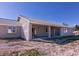 Covered patio with lattice detail and desert landscape at 5271 Deanna St, Pahrump, NV 89048