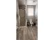 Updated bathroom with a shower, toilet and grab bars at 5271 Deanna St, Pahrump, NV 89048