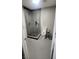 Modern bathroom with a glass shower enclosure and updated fixtures at 5271 Deanna St, Pahrump, NV 89048