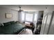 Spacious bedroom with a large bed and window seat at 5271 Deanna St, Pahrump, NV 89048