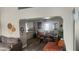 Bright dining room adjacent to kitchen, featuring wooden table and chairs at 5271 Deanna St, Pahrump, NV 89048
