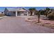 Single-story house with carport and desert landscaping at 5271 Deanna St, Pahrump, NV 89048