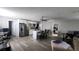 Open concept kitchen with island, stainless steel appliances, and modern cabinetry at 5271 Deanna St, Pahrump, NV 89048