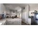 Modern kitchen with white cabinets and island at 5271 Deanna St, Pahrump, NV 89048