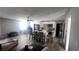 Modern kitchen with white cabinets and island at 5271 Deanna St, Pahrump, NV 89048