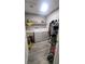 Convenient laundry room with washer, dryer, and storage shelves at 5271 Deanna St, Pahrump, NV 89048