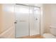 Clean shower with glass enclosure and tile surround at 5436 Red Sun Dr, Las Vegas, NV 89149