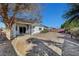 Large back yard with decorative rock borders and plenty of space for entertaining at 5919 Pavilion Lakes Ave, Las Vegas, NV 89122