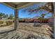 Large backyard features an open space ready for customization, surrounded by a block wall at 5919 Pavilion Lakes Ave, Las Vegas, NV 89122