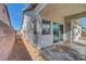 Side view of backyard and patio, showcasing space and potential for outdoor living at 5919 Pavilion Lakes Ave, Las Vegas, NV 89122