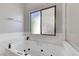 Close-up of the bathroom's large soaking tub with jets at 5919 Pavilion Lakes Ave, Las Vegas, NV 89122