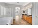 Bathroom featuring a soaking tub, shower, and double sink vanity at 5919 Pavilion Lakes Ave, Las Vegas, NV 89122