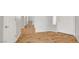 The entryway with wood-look flooring and white doors and trim at 5919 Pavilion Lakes Ave, Las Vegas, NV 89122