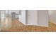 Bright hallway featuring modern flooring and neutral wall colors at 5919 Pavilion Lakes Ave, Las Vegas, NV 89122