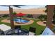 Backyard rendered image featuring a stunning pool, lounge area, fire pit, and desert landscaping at 5919 Pavilion Lakes Ave, Las Vegas, NV 89122