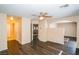 Spacious living room with dark wood floors and high ceilings at 6068 Laughing Creek St, Las Vegas, NV 89148