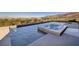 Stunning infinity pool and spa with breathtaking views of the city and surrounding landscape at 609 Sleeping Dragon Dr, Henderson, NV 89012