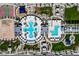 Aerial view of community pool, playground, and basketball court at 6815 Sage Gold Ct, North Las Vegas, NV 89086