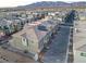 Aerial view of a townhouse with solar panels and a community view at 6815 Sage Gold Ct, North Las Vegas, NV 89086