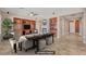 Spacious living room featuring built-in shelving and fireplace at 8774 Killians Greens Dr, Las Vegas, NV 89131