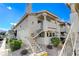 Inviting exterior with stairs leading to condo entrance at 929 Rockview Dr # 202, Las Vegas, NV 89128