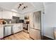 Modern kitchen featuring stainless steel appliances and white cabinets at 929 Rockview Dr # 202, Las Vegas, NV 89128