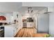 Well-equipped kitchen with white cabinets and stainless steel appliances at 929 Rockview Dr # 202, Las Vegas, NV 89128