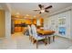 Kitchen with island, stainless steel appliances, and view of the pool at 9904 Garamound Ave, Las Vegas, NV 89117