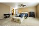 Main bedroom with plush seating and ensuite bathroom access at 9904 Garamound Ave, Las Vegas, NV 89117