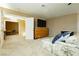Main bedroom with sitting area and access to home office at 9904 Garamound Ave, Las Vegas, NV 89117