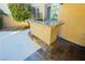 Brick outdoor bar with granite countertop at 9904 Garamound Ave, Las Vegas, NV 89117