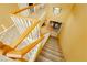Elegant staircase leading to the upper level of the house at 9904 Garamound Ave, Las Vegas, NV 89117