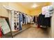 Large walk-in closet with ample shelving and hanging space at 9904 Garamound Ave, Las Vegas, NV 89117