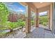 Relaxing backyard patio with brick columns and landscaping at 10375 Pescado Ln, Las Vegas, NV 89135