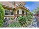 Home exterior showcasing a walkway, landscaping, and AC unit at 10375 Pescado Ln, Las Vegas, NV 89135