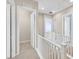 Upstairs hallway with access to bedrooms and closet at 10375 Pescado Ln, Las Vegas, NV 89135