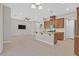 Open kitchen with island and view into living room at 10375 Pescado Ln, Las Vegas, NV 89135