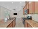 Kitchen with granite countertops and stainless steel sink at 10375 Pescado Ln, Las Vegas, NV 89135