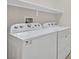 Laundry room with Whirlpool washer and dryer at 10375 Pescado Ln, Las Vegas, NV 89135
