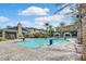 Community pool and relaxing patio area at 10375 Pescado Ln, Las Vegas, NV 89135