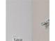 White wall with two small, white wall mounts at 10375 Pescado Ln, Las Vegas, NV 89135